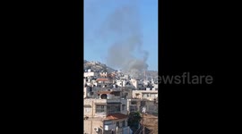 The footage shows burning buildings in Jenin refugee camp