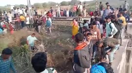 Twelve passengers killed when they leap from moving train amid fire false alarm