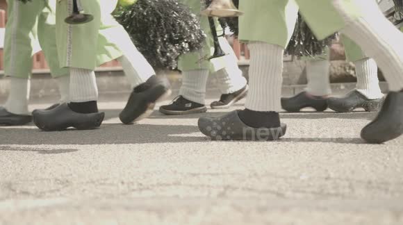 Close-up shoes at Carnival Parade on sunny day in Germany. Slow-Motion.