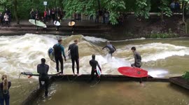 River-surfing on Munich's Eisbach river
