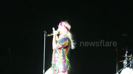 Kesha talks appears to be kissing her keyboard player, spits whip cream and beer at the crowd and talks about strippers during her performance at the Fantasy Springs Resort and Casino in Indio, CA
