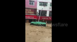 Residents rescue two bus passengers trapped in extreme floodwater
