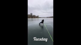 Four Wheeler Pulls Lawn Chair Across Ice