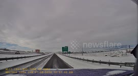 Truck Loses Control On Black Ice Bridge