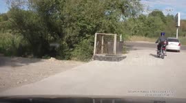 Biker Has A Lucky Close Call