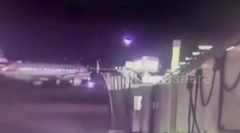 CCTV shows helicopter colliding with passenger plane while landing at airport