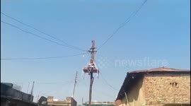 Hunger-strike farmer climbs electricity post to protest over government failure