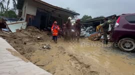 Five relatives all killed when their home is buried by landslide in Malaysia