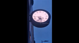 Doing time: Man 'trapped' inside artwork paints clock hands in cool installation
