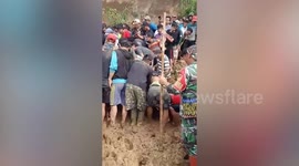 Sisters killed when landslide buries their home during heavy rain in Indonesia