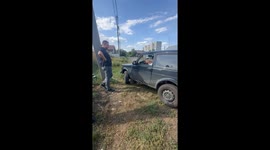 Car veers off road and hits fence in Orenburg, Russia