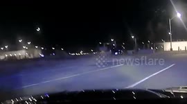 Police car chases ends with suspect crashing through Air Force fence