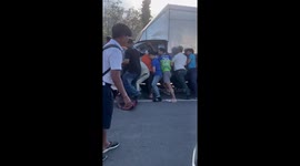 Hero passersby help to lift car to save pedestrian trapped underneath