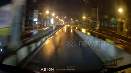 Truck almost hits car driving the wrong way through tunnel