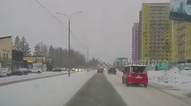 Car slides on ice and collides with oncoming vehicle, causing child to cry in terror