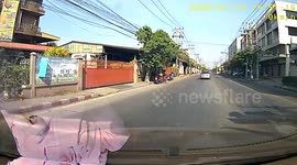 Driver swerves to avoid reckless trucker overtaking into their lane