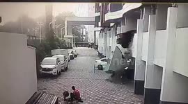 Bad driver reverses through concrete wall and crashes from second floor of car park