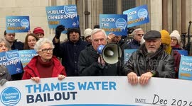 Campaigners gather outside the high court in London for the Thames Water bailout hearing