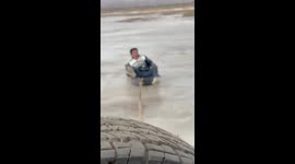 Man pulled by car and falls while playing on frozen river in Gansu, China