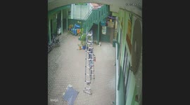Man loses balance and falls from ladder in West Bandung, Indonesia