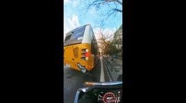 Motorbike rider falls after car door opens unexpectedly in İstanbul