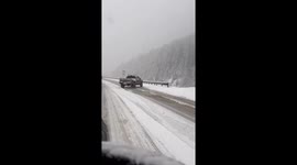Truck slides on snowy road near Georgetown, Colorado