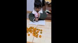Child uses pencil sharpener as hammer for homework in Hunan province, China