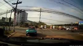 Motorcycle collision flings riders through the air at intersection