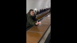 Man falls on escalator after greeting acquaintances in St. Petersburg, Russia
