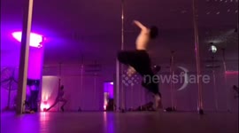 The guy fell off the pole during the performance of the trick!