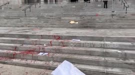 Los Angeles City Hall Vandalized with Graffiti by Protesters Advocating for Immigration Rights