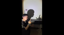 Chinese man creates shadow dance with fingers