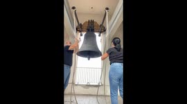 Joyful moment: Couple rings the bell in Mondella's historic church after rituals