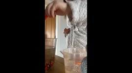 Panic ensues as the girl drops fish while changing water in fish bowl