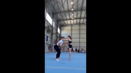 Comedy ensues when acrobatics trick goes awry during duo workout session
