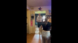 Dad wears daughter’s shirt after getting all his favorite socks scooped up by her