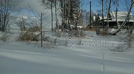 One siberian willage, a house near th lake baikal. You can see open water at the winter and enjoy of waves