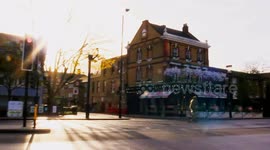 A View Of The Duchess Pub and Traffic on Battersea Road