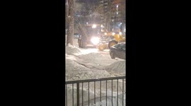 Skilled Snow Plow Doing Donuts