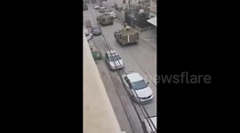 Israeli armoured vehicles in the southern area of Hebron city in the West Bank