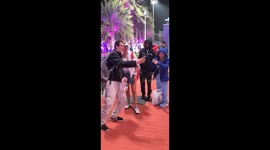 Polish fans taking selfie and photos with  Magdalena Frech at the Qatar TotalEngeries Open held at Khalifa International Tennis and Squash Complex.