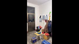 Chinese woman cleverly hides among coats in hide-and-seek game