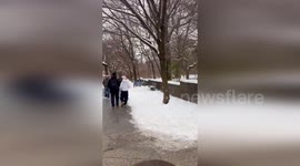 US: Winter Fun in Central Park as New Yorkers Flock to Cedar Hill for Sledding