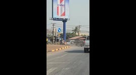 Out-of-control tractor causes chaos on road in Cambodia