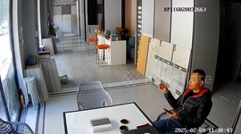 Worker's cigarette break interrupted as van crashes through glass