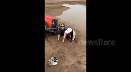 Women saved from terrifying situation as riverbank drive goes wrong seeing them sink into deep mud