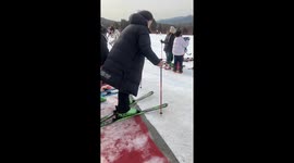 Hapless skier crashes into mother and daughter on slope in China
