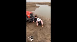 Two women sink into mud when jeep gets stuck on trail