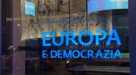 The writing ‘Europe and Democracy’ on the window of the Esperienza Europa – David Sassoli exhibition space dedicated to the EU, promoted by the European Parliament and Commission and named after the former President of the European Parliament in Rome.