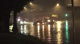 US, Los Angeles: Riverside Major Street Flooding Leaves Motorist Stranded